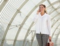 Young business woman talking on mobile phone Royalty Free Stock Photo