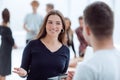 Young business woman talking to her colleague Royalty Free Stock Photo