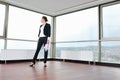 Young business woman throw papers in air