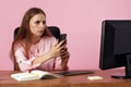 young business woman using phone in the office