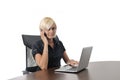 Young business woman working in office on laptop Royalty Free Stock Photo