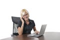 Young business woman working in office on laptop Royalty Free Stock Photo