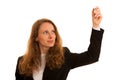 Young business woman writting with marker on a transparent board