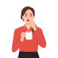 Young business woman yawning holding a cup of hot coffee with steam come out