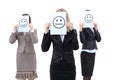 Young business women hiding behind a smiley face