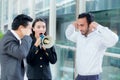 Young business woman working at the office, shouting and yellin Royalty Free Stock Photo