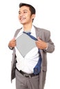 Young businessman acting like a super hero and tearing his shirt