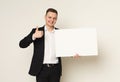 Young businessman with blank white paper Royalty Free Stock Photo