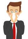 Young businessman blowing his nose in handkerchief.