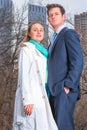 Young Businessman and Businesswoman standing outdoors in winter, looking forward Royalty Free Stock Photo