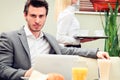 Young Businessman In A Cafe