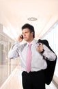 Young businessman is calling on mobile. Royalty Free Stock Photo