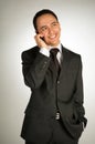 Young businessman with cellphone Royalty Free Stock Photo