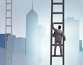 Young businessman climbing career ladder Royalty Free Stock Photo