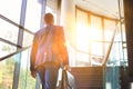 Young businessman climbing stairs in office Royalty Free Stock Photo