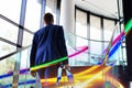 Young businessman climbing stairs in office Royalty Free Stock Photo