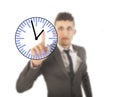 Young businessman with clock isolated