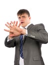 Young businessman defending himself Royalty Free Stock Photo
