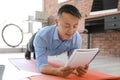 Young businessman doing exercises in office Royalty Free Stock Photo