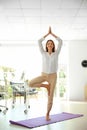 Young businessman doing yoga exercises Royalty Free Stock Photo