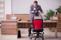 Young businessman employee in bullying concept in the office