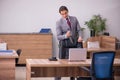 Young businessman employee in bullying concept in the office