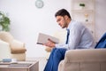 Young businessman employee waiting for business meeting Royalty Free Stock Photo