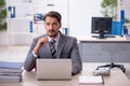 Young businessman employee working in the office Royalty Free Stock Photo