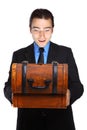 Young businessman excited about a treasure box Royalty Free Stock Photo