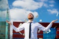 Young businessman with falling cash money Royalty Free Stock Photo