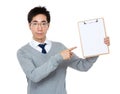 Young businessman finger point to clipboard Royalty Free Stock Photo