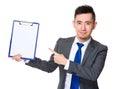 Young Businessman finger point to clipboard Royalty Free Stock Photo