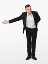 Young businessman gesturing welcome isolated Royalty Free Stock Photo