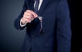Young man hand over keys Royalty Free Stock Photo