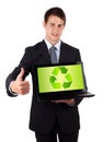 Young businessman holding laptop with recycle icon Royalty Free Stock Photo