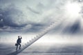 Businessman with binoculars on the staircase Royalty Free Stock Photo