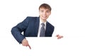 Young businessman holding white blank board Royalty Free Stock Photo