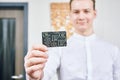 Young businessman holds a credit card in his hands. concept of success, startup Royalty Free Stock Photo