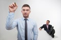 Young businessman holds marker writing, drawing Royalty Free Stock Photo