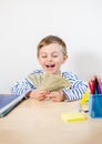 Young businessman holds money in his hands, american hundred dollars cash. American one hundred dollars in cash Royalty Free Stock Photo