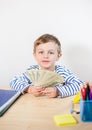 Young businessman holds money in his hands, american hundred dollars cash. American one hundred dollars in cash Royalty Free Stock Photo