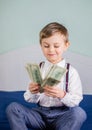 Young businessman holds money in his hands, american hundred dollars cash. American one hundred dollars in cash Royalty Free Stock Photo