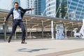 Businessman jumping with joy in success. Focus is on the left Royalty Free Stock Photo