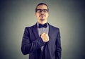 Overconfident man posing on gray Royalty Free Stock Photo