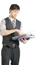 Young Businessman Looking at Files. Isolated Royalty Free Stock Photo