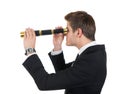 Young businessman looking through handheld telescope