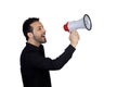 Young businessman with a Megaphone proclaiming something