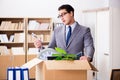 The young businessman moving offices after being made redundant