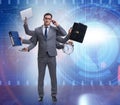 Young businessman in multitasking concept Royalty Free Stock Photo