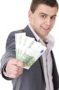 Young Businessman Offering Money Royalty Free Stock Photo